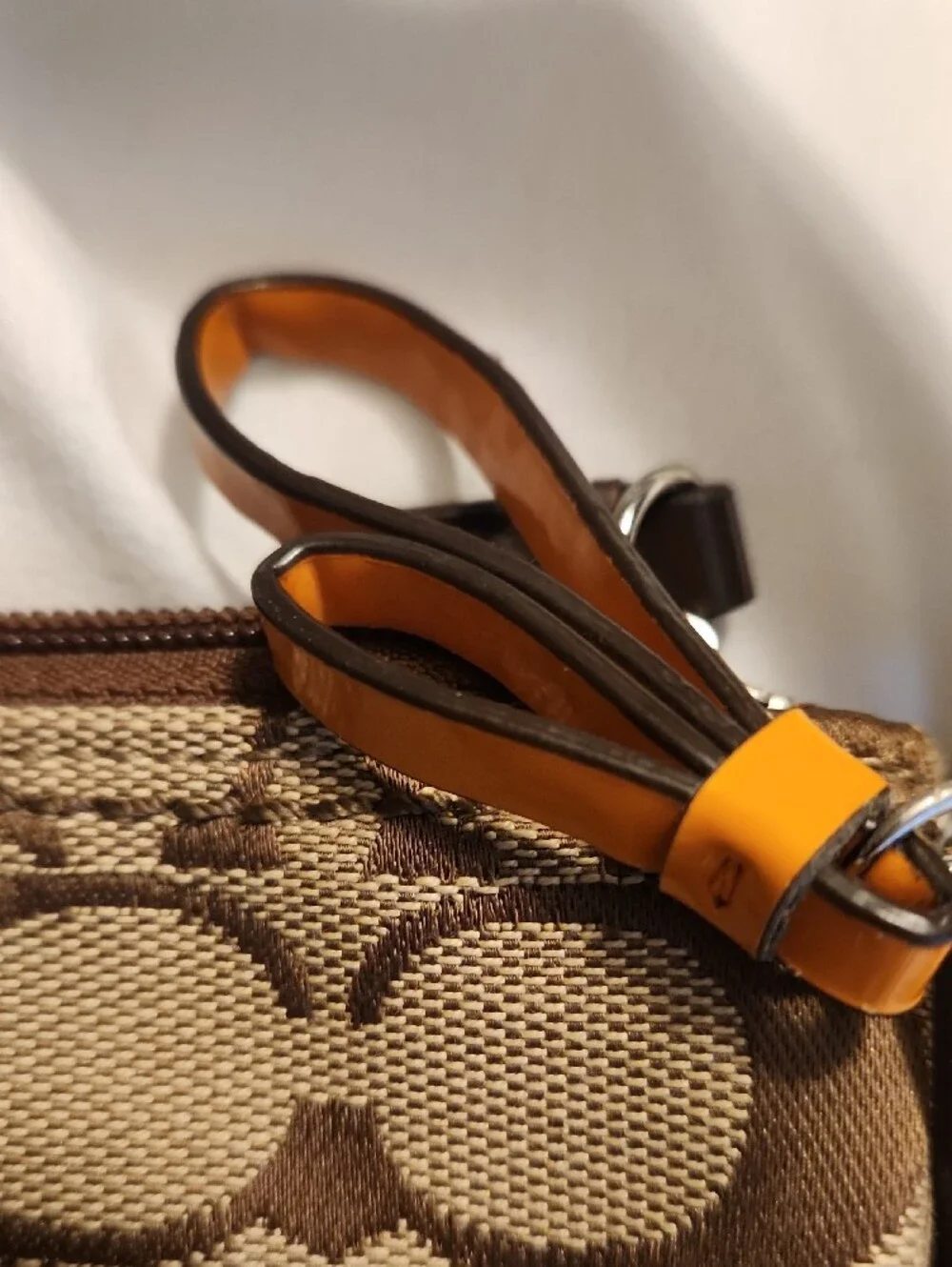 brown Coach Signature Jacquard crossbody bag